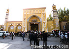 The mosque is decorated with yellow and white tiles.